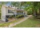 House exterior with walkway and landscaping at 104 Streambank Ct, Temple, GA 30179