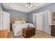 Spacious bedroom with gray walls, ceiling fan, and ample natural light at 104 Streambank Ct, Temple, GA 30179