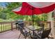 Relaxing deck with seating area and gas grill at 104 Streambank Ct, Temple, GA 30179