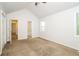 Main bedroom with access to bathroom and carpet flooring at 4245 Brandy Ann Dr, Acworth, GA 30101