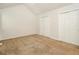Main bedroom with double closets and carpet flooring at 4245 Brandy Ann Dr, Acworth, GA 30101