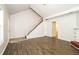 Living room with staircase and laminate flooring at 4245 Brandy Ann Dr, Acworth, GA 30101