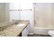 Bathroom with granite countertop, updated vanity, and bathtub shower combo at 4245 Brandy Ann Dr, Acworth, GA 30101