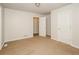 Well-lit bedroom with neutral decor and carpet at 4245 Brandy Ann Dr, Acworth, GA 30101