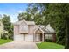 Two-story house with two-car garage and landscaped lawn at 4245 Brandy Ann Dr, Acworth, GA 30101