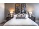 Serene bedroom with king-size bed, neutral tones, and stylish decor at 3351 Orwell Way # 2104, Cumming, GA 30041