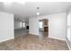 Dining room with tile flooring and adjacent kitchen at 5908 Bluegrass Vw, Fairburn, GA 30213