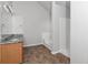Bathroom with granite countertop, tiled floor, and shower/tub combo at 5908 Bluegrass Vw, Fairburn, GA 30213