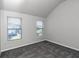 Bright bedroom with grey carpet and two large windows at 5908 Bluegrass Vw, Fairburn, GA 30213