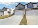 Modern townhome with stone exterior and attached garage at 269 Bald Ave # 18, Stockbridge, GA 30253