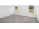 Well-lit bedroom featuring neutral walls and carpet at 269 Bald Ave # 18, Stockbridge, GA 30253