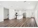 Open concept kitchen with island, stainless steel appliances, and hardwood floors at 269 Bald Ave # 18, Stockbridge, GA 30253