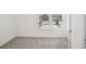 Empty bedroom with neutral carpet and two windows at 269 Bald Ave # 18, Stockbridge, GA 30253