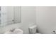 Clean bathroom with white vanity, toilet, and mirror at 269 Bald Ave # 18, Stockbridge, GA 30253