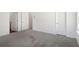 Bright bedroom with carpet and access to bathroom at 269 Bald Ave # 18, Stockbridge, GA 30253