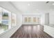 Spacious living room with hardwood floors and lots of natural light at 269 Bald Ave # 18, Stockbridge, GA 30253