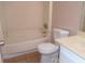 Clean bathroom with a bathtub, toilet and sink at 1038 Ascot Ct, Riverdale, GA 30296