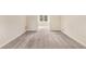 Simple hallway with neutral walls and carpeting at 3340 Underwood Se Rd, Conyers, GA 30013