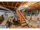 Unfinished basement with stairs and ample storage at 4872 Northland Dr, Atlanta, GA 30342