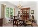 Classic dining room with a formal table, hutch, and chandelier at 4872 Northland Dr, Atlanta, GA 30342