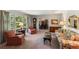 Spacious living room featuring hardwood floors, large windows, and comfortable seating at 4872 Northland Dr, Atlanta, GA 30342