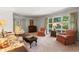 Bright living room with hardwood floors, ample natural light, and comfortable seating at 4872 Northland Dr, Atlanta, GA 30342