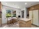 Eat-in kitchen with breakfast nook and view of backyard at 4872 Northland Dr, Atlanta, GA 30342