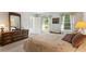 Bedroom with two windows and ensuite bath at 4872 Northland Dr, Atlanta, GA 30342