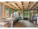 Sunroom with pool table and access to backyard at 4872 Northland Dr, Atlanta, GA 30342