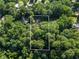 Aerial view showing home nestled in a wooded area at 4872 Northland Dr, Atlanta, GA 30342
