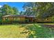 Brick ranch home with a well-maintained lawn at 4872 Northland Dr, Atlanta, GA 30342