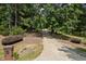 Gravel driveway with wooden gates at 3651 Chandler Haulk Rd, Loganville, GA 30052