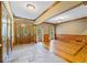 Spacious entry with tile floors and wood accents at 3651 Chandler Haulk Rd, Loganville, GA 30052
