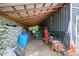 Covered storage area for gardening equipment and tools at 3651 Chandler Haulk Rd, Loganville, GA 30052