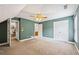Bedroom with view into game room and ensuite bathroom at 3651 Chandler Haulk Rd, Loganville, GA 30052