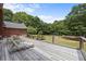Deck with lounge chairs and table, overlooking backyard at 3651 Chandler Haulk Rd, Loganville, GA 30052