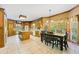 Eat-in kitchen with wood cabinets and tile floors at 3651 Chandler Haulk Rd, Loganville, GA 30052