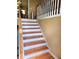 Interior staircase with wood and white risers at 6561 Harrington Pl, Douglasville, GA 30135