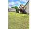 Large backyard with deck and fenced area at 6561 Harrington Pl, Douglasville, GA 30135