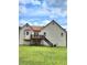 House back with deck, stairs, and yard at 6561 Harrington Pl, Douglasville, GA 30135