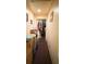 Long hallway with carpet, leading to other rooms. Some boxes are present at 2054 Marco Dr, Decatur, GA 30032