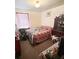 Bedroom with a double bed, dresser, and window coverings at 2054 Marco Dr, Decatur, GA 30032