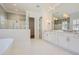 Elegant bathroom with double vanity, marble countertops, and a large mirror at 4215 Tattnall Run, Acworth, GA 30101