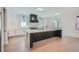 Open concept kitchen with large island and white cabinets at 4215 Tattnall Run, Acworth, GA 30101