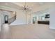 Open concept living room with hardwood floors and chandelier at 4215 Tattnall Run, Acworth, GA 30101