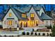 Luxury two-story home with stone accents and three-car garage at 4215 Tattnall Run, Acworth, GA 30101