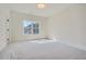 Spacious bedroom with large windows, carpet, and lots of natural light at 4215 Tattnall Run, Acworth, GA 30101