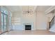 Living room with fireplace, built-in shelving, and hardwood floors at 4215 Tattnall Run, Acworth, GA 30101