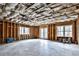 Unfinished basement with windows and framing at 4215 Tattnall Run, Acworth, GA 30101