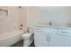 Clean bathroom with white vanity, bathtub, and updated fixtures at 4215 Tattnall Run, Acworth, GA 30101